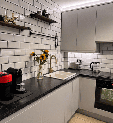 Kitchen Cabinet and wall painted, finished by Cornelius Green Decorators in Malahide