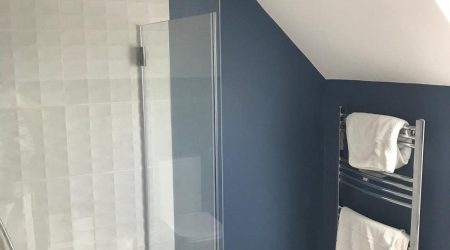 completed residential bathroom dual tone white and navy blue interior painting by Cornelius Green Decorators in Dublin
