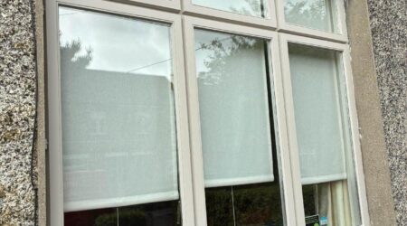 External completed spray painting photo of window with white edges by Cornelius Green Decorators