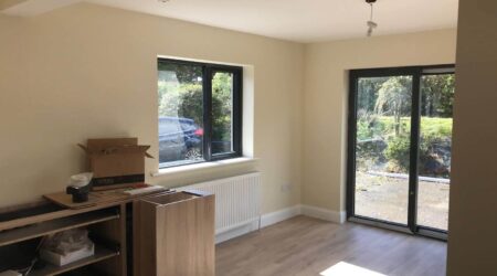 Completed Interior painting of residential extension room in cream and white trim by Cornelius Green Decorators