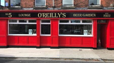 Completed Exterior red and black facade painting photo of O'Reilly's Beer Garden by Cornelius Green Decorators
