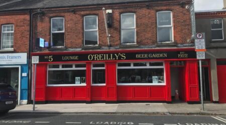 Completed Exterior red and black facade painting photo of O'Reilly's Beer Garden by Cornelius Green Decorators